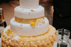 Closeup of a white wedding cake on the table
