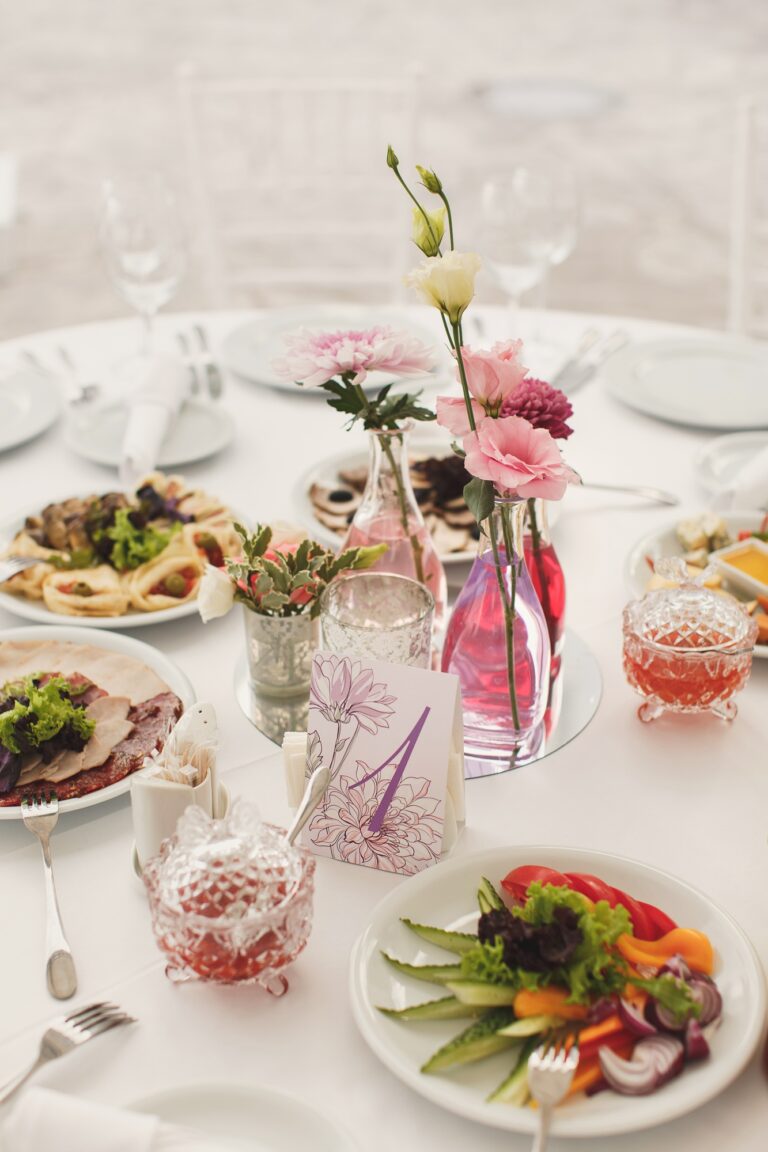 The flowers at the wedding table. Tent.