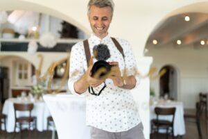 The photographer, with the focus on camera