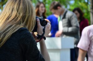 Wedding photographer in the process of his work. Professional photographer