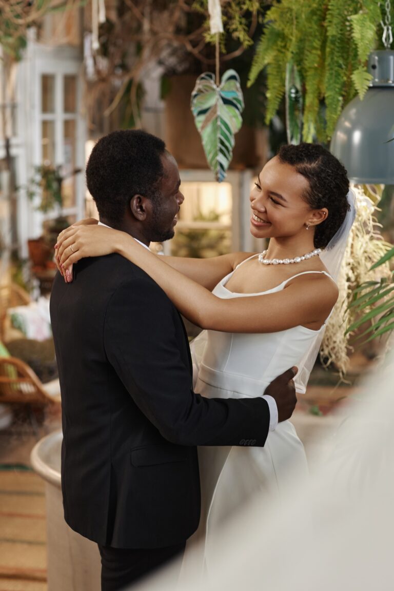 Young black couple getting married and dancing together