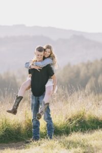 bride and groom couple hug each other