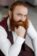 Redhead groom in a suit before wedding ceremony